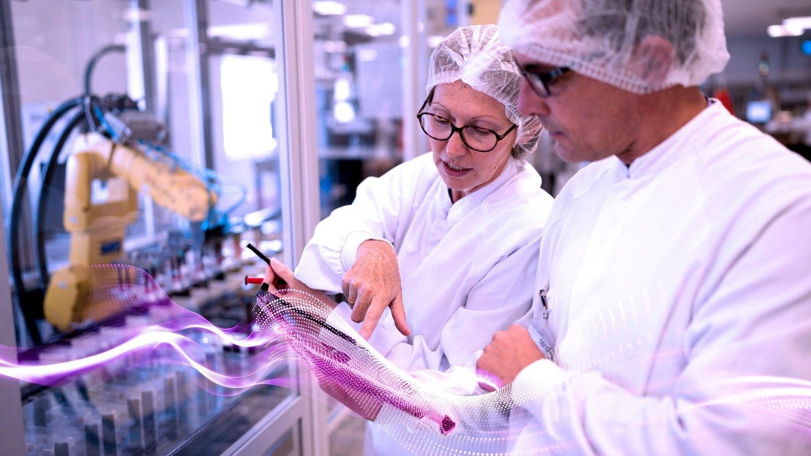 Sébastien Duhamel and Marjorie Lecomte, pharmaceutical manufacturing technicians leveraging advanced analytics, AI-powered manufacturing systems and digital innovation at Sanofi's Le Trait facility in France