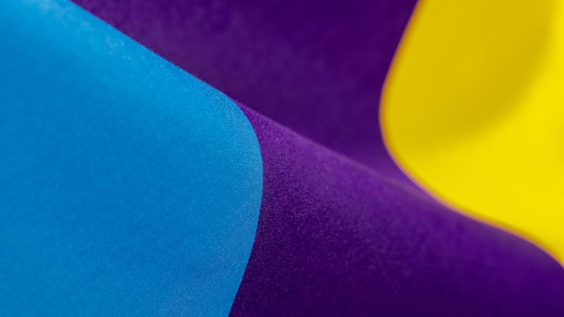 The Meningitis Flag featuring blue, yellow, and red colors, symbol to unite people in the fight against meningitis