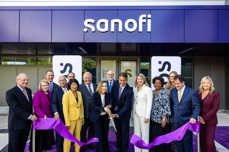 Group of people posing for an announcement picture